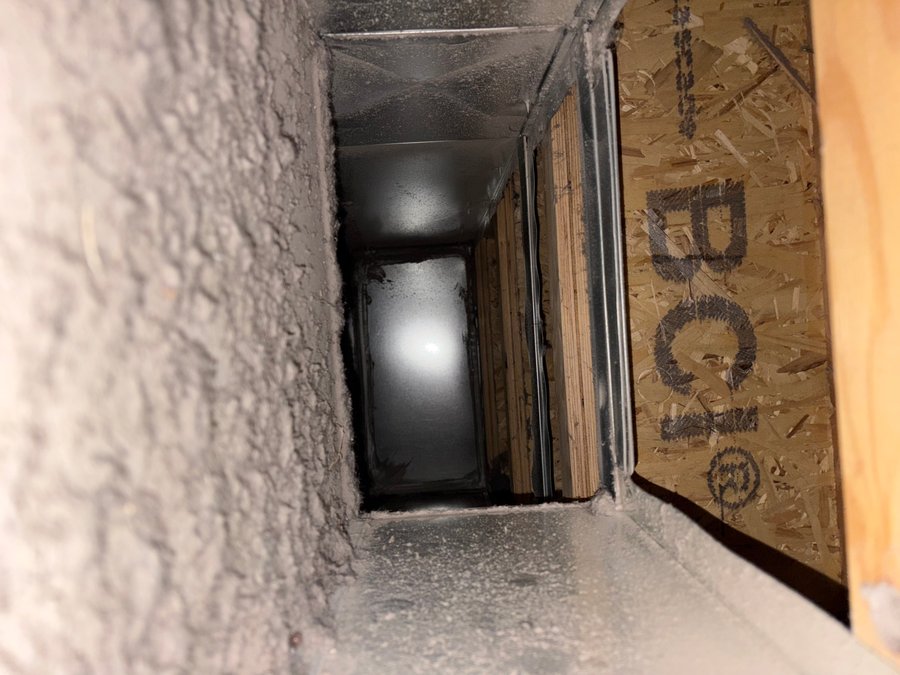 Before: dusty HVAC duct interior