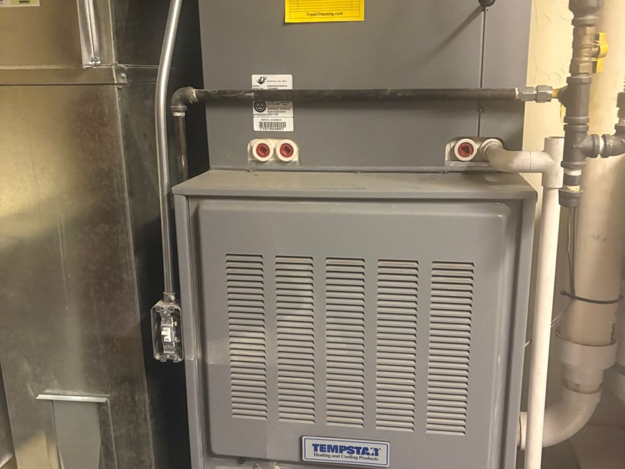 Before: aging Tempstar furnace flagged for replacement