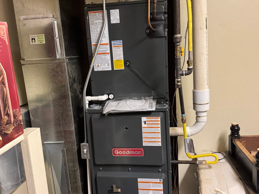 After: new Goodman furnace installed in a finished closet