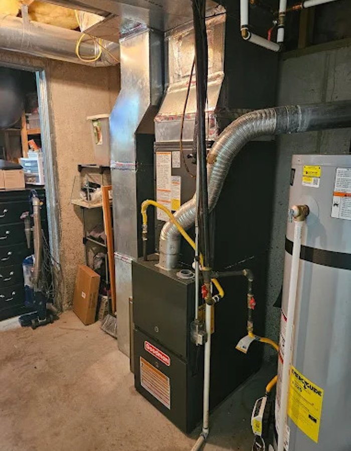 Furnace and water heater installed in a home mechanical room